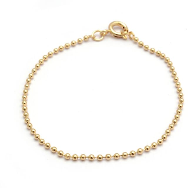 Pulsera bolitas 1,5mm - 14,5 A 18,5cm. Enchapada en Oro 18K.